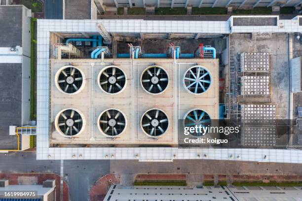 close-up of exhaust fan on factory roof - cooling tower stock pictures, royalty-free photos & images