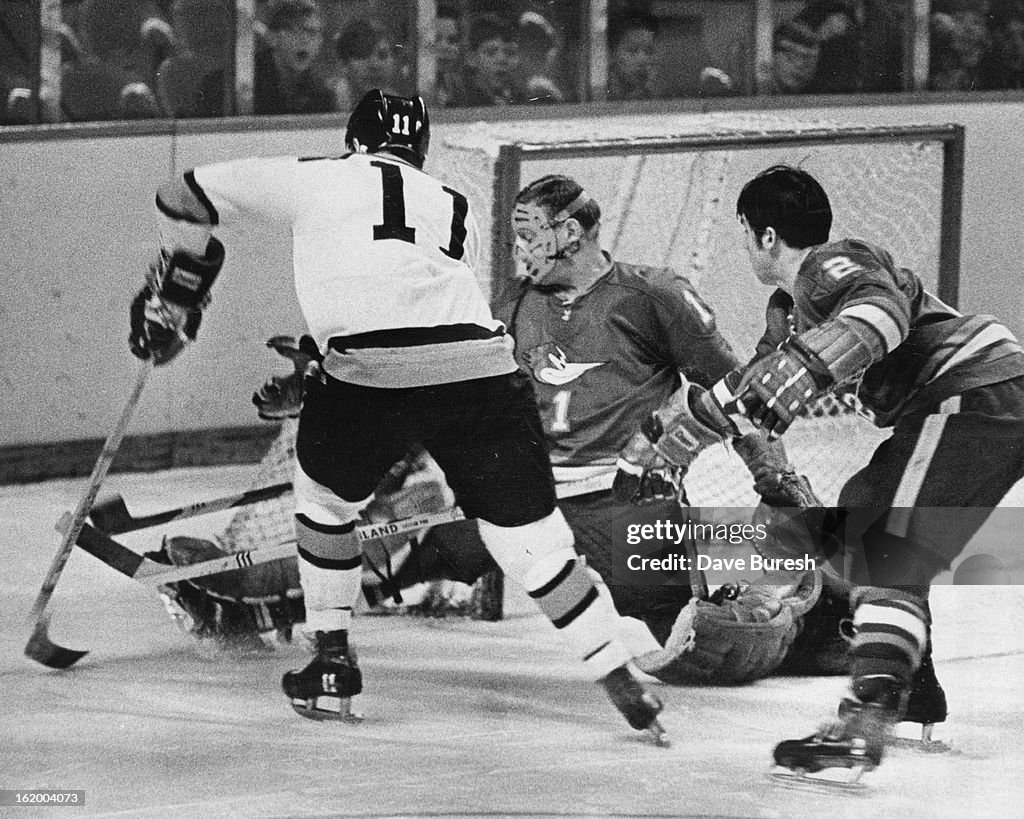 DEC 20 1969; Denver Spurs (Action) 5p; Phoenix Netminder Does The Split To Save On The One; ***** go