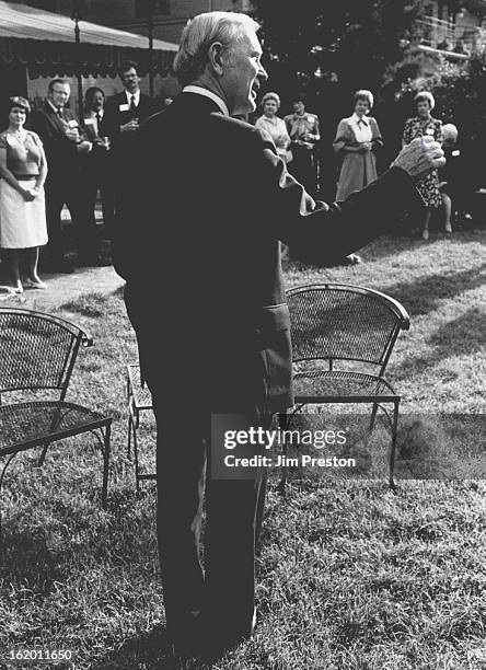 Dale Tooley speaks to group of followers at a reception put on by some builder friends, where he got a warm up for the evening's debate. The...