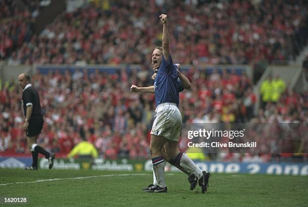 Kevin Davies of Chesterfield punches the air in triumph after a goal for Chesterfield in the FA Cup Semi-Final against Middlesbrough at Old Trafford...