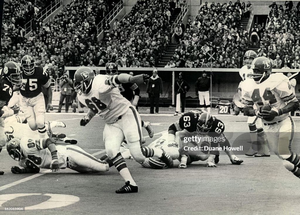 NOV 18 1973, NOV 19 1973; Bronco guard Larron Jackson (68) moved tackle following Marv Montgomery's