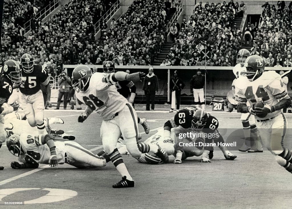 NOV 18 1973, NOV 19 1973; Bronco guard Larron Jackson (68) moved tackle following Marv Montgomery's 