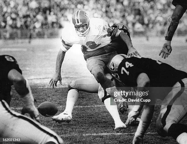 Little Tight Around the Middle; Running back from Lynch of the Denver Broncos drops the football as the second period of Sunday's game in Oakland....