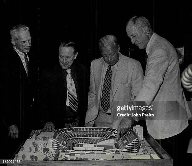 Mile High Stadium, Baseball Version, Shown To McPhail; Gerald Phipps, chairman of board of Empire Sports, Inc., shows American League president Lee...