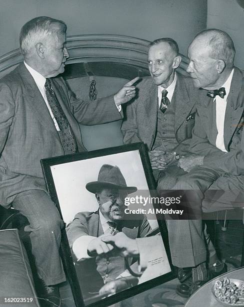 Talking over old times at the Denver Press dub Thursday night during a party honoring Abe Pollock upon his eighty-third birthday are Luke Kavanaugh...