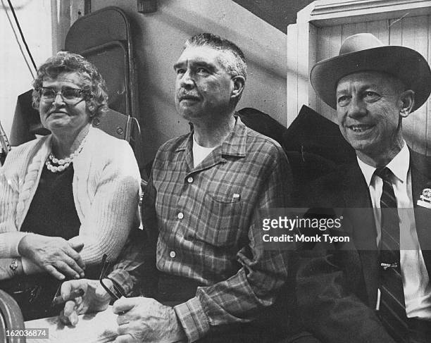 Willard Simms, right, manager of National Western Stock Show, was host Monday to Lt. And Mrs. Jerry Mangan during matinee. It was the first outing...