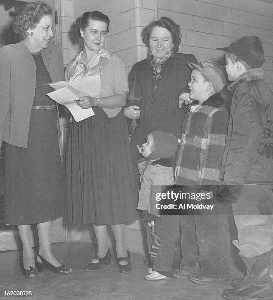Ann Adele Herrington and Mrs. Marie Linam, both of Beach school, welcome two new pupils, Doug and Billy and their mother, Mrs. Roy Bowen, newly...