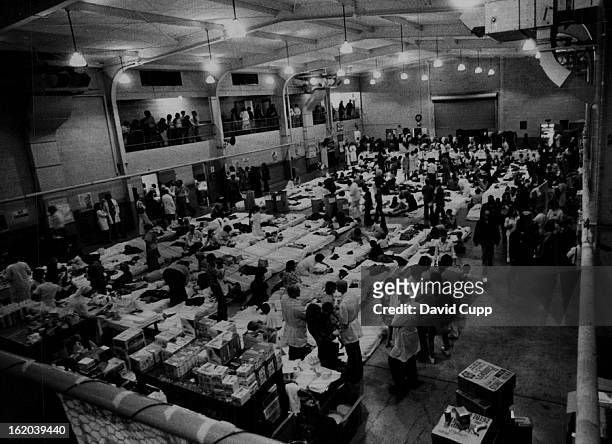 Vietnam - War Orphans; New Lives Begin Here; Harman Hall at San Francisco's Presidio is packed with mattresses, volunteers and Vietnamese orphans in...