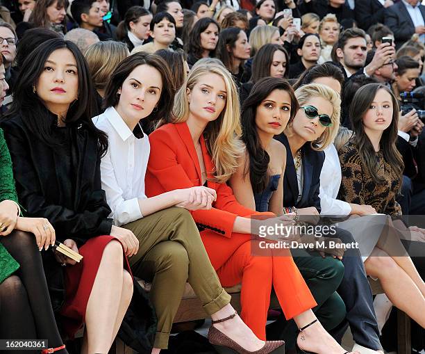 Vicki Zhao, Michelle Dockery, Rosie Huntington-Whiteley, Freida Pinto, Rita Ora, Kate Beckinsale and Lily Mo Sheen sit in the front row for the...