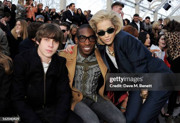 Jake Bugg, Tinie Tempah and Rita Ora sit in the front row for the Burberry Prorsum Autumn Winter 2013 Womenswear Show at Kensington Gardens on...