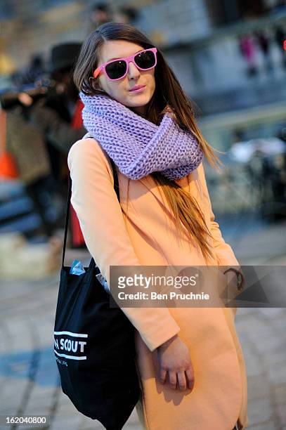Blogger Magdalena Wieclaw poses wearing an outfit from H+M with jeans and glasses from Primark at Somerset House during London Fashion Week F/W 2013...