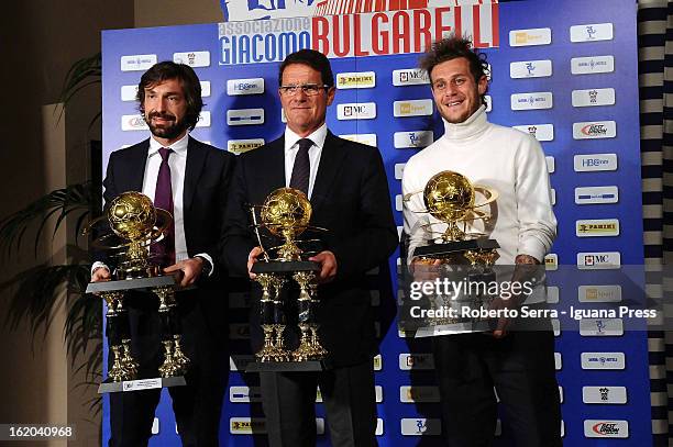 Andrea Pirlo of Juventus, Fabio Capello and Alessandro Diamanti of Bologna FC pose with their awards at Hotel Savoyon February 18, 2013 in Bologna,...