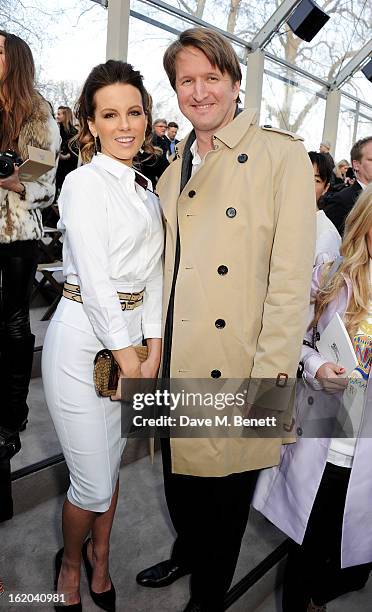 Kate Beckinsale and Tom Hooper attend the Burberry Prorsum Autumn Winter 2013 Womenswear Show at Kensington Gardens on February 18, 2013 in London,...