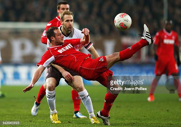 Florian Kringe of St. Pauli and Matthias Lehmann of Koeln compete for the ball during the Second Bundesliga match between FC St. Pauli and 1. FC...