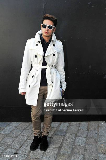 Blogger Ronan Summers wearing Burberry trench coat, Top Shop shirt, Tommy Hilfiger v necked sweater, Top Man trousers, accessorised with bespoke...