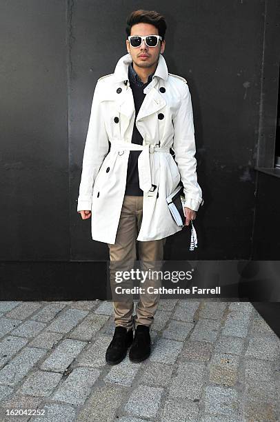 Blogger Ronan Summers wearing Burberry trench coat, Top Shop shirt, Tommy Hilfiger v necked sweater, Top Man trousers, accessorised with bespoke...