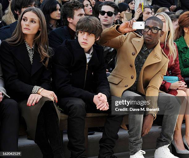 Olivia Palermo, Jake Bugg and Tinie Tempah sit in the front row for the Burberry Prorsum Autumn Winter 2013 Womenswear Show at Kensington Gardens on...