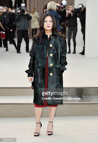 Vicki Zhao wearing Burberry, arrives at the Burberry Prorsum Autumn Winter 2013 Womenswear Show on February 18, 2013 in London, England.
