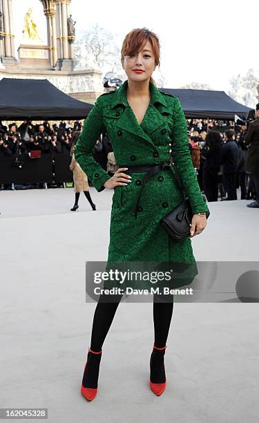 Kim Hee-sun arrives at the Burberry Prorsum 2013 Autumn Winter Womenswear Show at Kensington Gardens on February 18, 2013 in London, England.