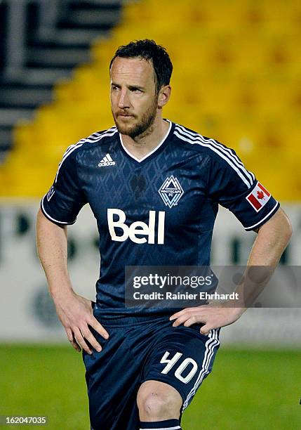 Andy O'Brien of the Vancouver Whitecaps FC looks on before their game against the Charleston Battery at Blackbaud Stadium on February 16, 2013 in...