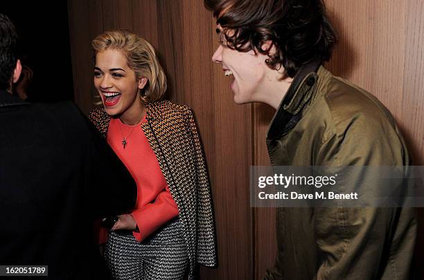 Rita Ora L) and Harry Styles attend the AnOther Magazine and Dazed & Confused party with Belvedere Vodka at the Cafe Royal hotel on February 18, 2013...