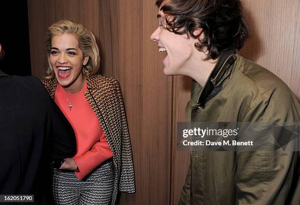 Rita Ora L) and Harry Styles attend the AnOther Magazine and Dazed & Confused party with Belvedere Vodka at the Cafe Royal hotel on February 18, 2013...