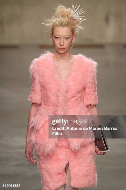 Model walks the runway at the Fashion East show during London Fashion Week Fall/Winter 2013/14 at TopShop Show Space on February 18, 2013 in London,...