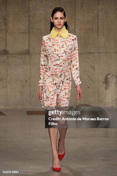 Model walks the runway at the Fashion East show during London Fashion Week Fall/Winter 2013/14 at TopShop Show Space on February 18, 2013 in London,...