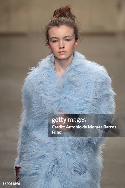 Model walks the runway at the Fashion East show during London Fashion Week Fall/Winter 2013/14 at TopShop Show Space on February 18, 2013 in London,...