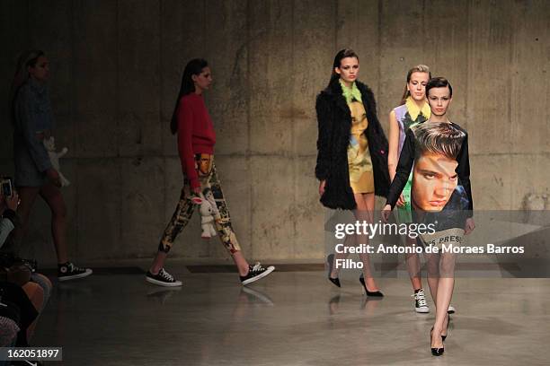 Model walks the runway at the Fashion East show during London Fashion Week Fall/Winter 2013/14 at TopShop Show Space on February 18, 2013 in London,...