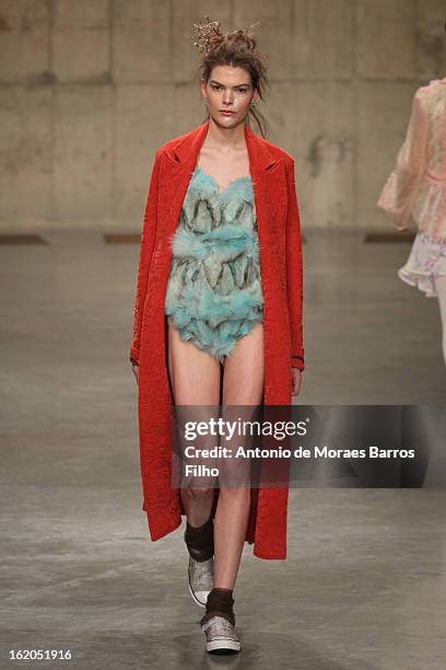 Model walks the runway at the Fashion East show during London Fashion Week Fall/Winter 2013/14 at TopShop Show Space on February 18, 2013 in London,...