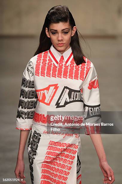 Model walks the runway at the Fashion East show during London Fashion Week Fall/Winter 2013/14 at TopShop Show Space on February 18, 2013 in London,...
