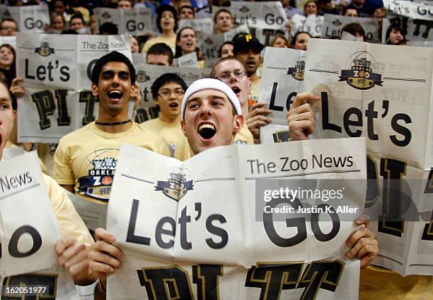 The Oakland Zoo cheers during the game against the Notre Dame Fighting Irish at Petersen Events Center on February 18, 2013 in Pittsburgh,...