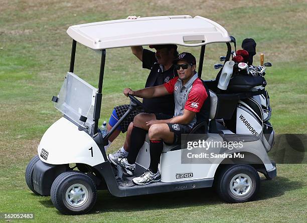 Jerome Ropati of the Warriors rides a buggy during a New Zealand Warriors NRL golf day at Titirangi Golf Club on February 19, 2013 in Auckland, New...