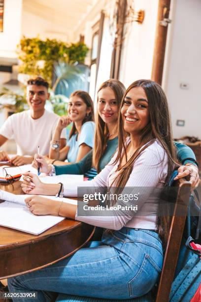 group of teenage students studying at home - high school senior stock pictures, royalty-free photos & images