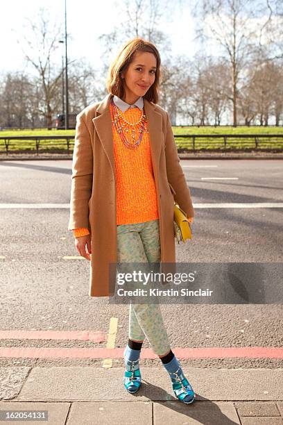 Tiany Kiriloff wears Nicholas Kirkwood shoes, Jill Sanders jacket and Kenzo sweater on day 3 of London Womens Fashion Week Autumn/Winter 2013 on...