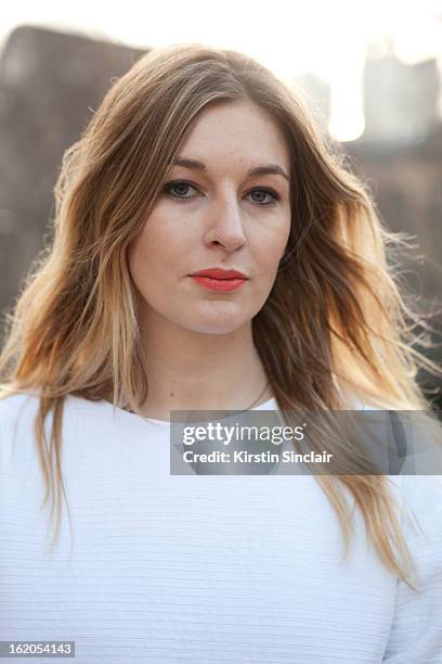 Freelance fashion journalist Camille Charriere wears unique topshop, H&M Bag, on day 3 of London Womens Fashion Week Autumn/Winter 2013 on February...