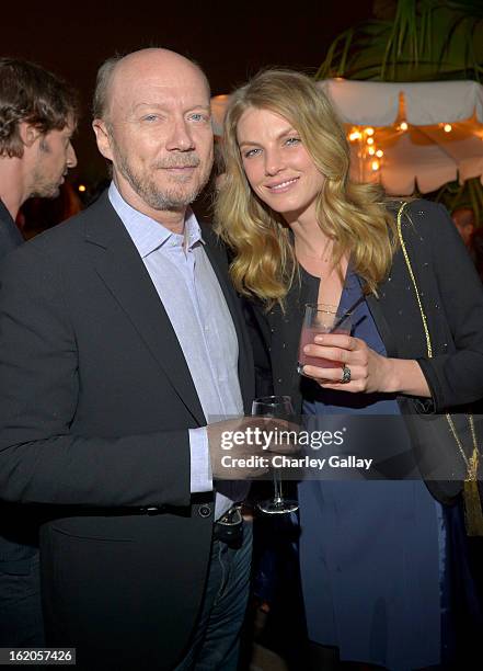 Filmmaker Paul Haggis and model Angela Lindvall wearing Juicy Couture attend Vanity Fair and Juicy Couture's Celebration of the 2013 Vanities...