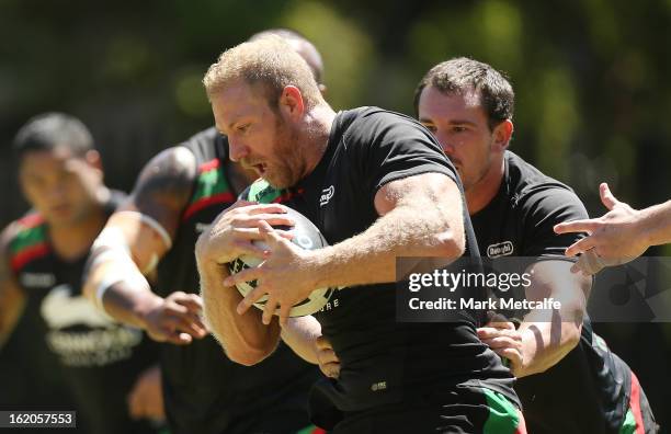 Michael Crocker is tackled during a South Sydney Rabbitohs NRL training session at the National Centre for Indigenous Excellence on February 19, 2013...