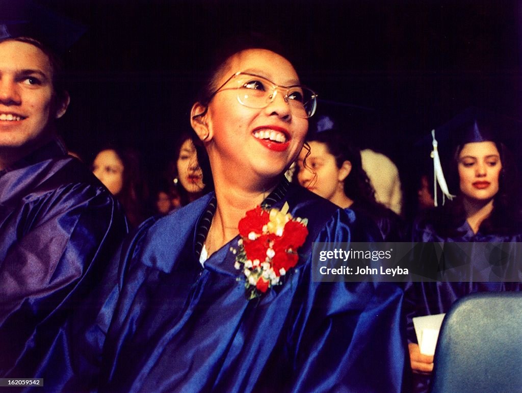1-26-1996; Graduation - Elizabeth Cupp; Beams at the ceremony marking ...