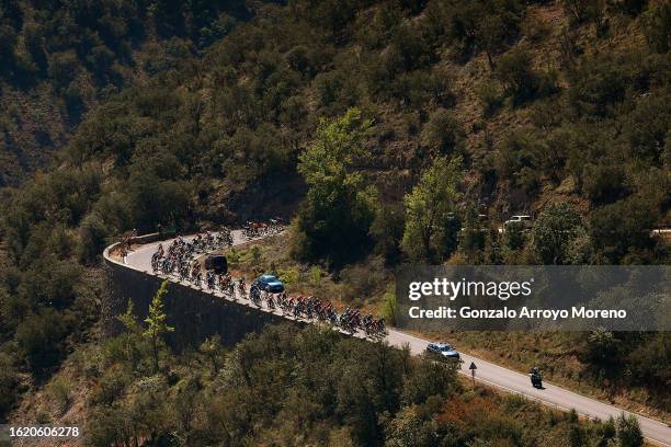 General view of the peloton passing through a forest landscape during the 45th Vuelta a Burgos 2023, Stage 3 a 183km stage from Sargentes de la Lora...