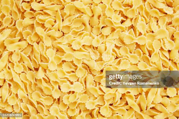 farfalline as a background - macaroni stock pictures, royalty-free photos & images