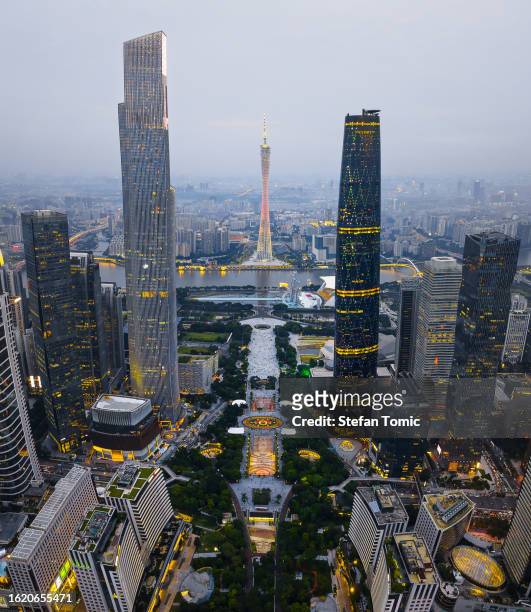 aerial skyline of guangzhou viewed above the huacheng square , the capital city of guangdong province of china - guangzhou stock pictures, royalty-free photos & images