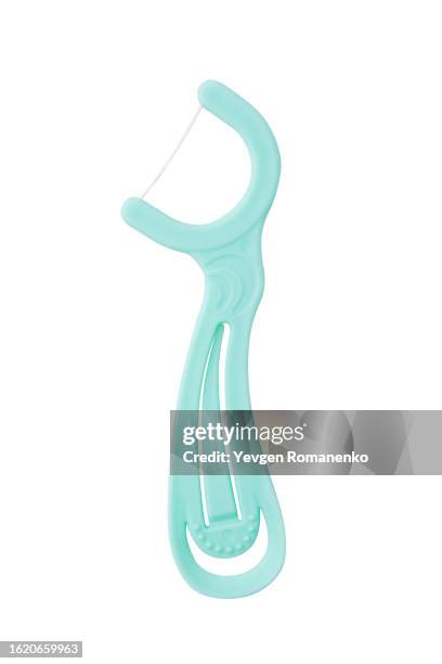 tooth cleaning tool with dental floss, isolated on white background - dental floss stock pictures, royalty-free photos & images