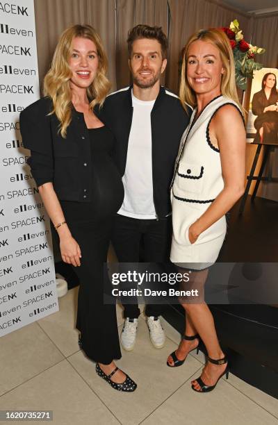 Hannah Cooper, Joel Dommett and Cat Deeley attend the launch of new fragrance brand e11even founded by Cat Deeley and Amanda Grossman and sold...