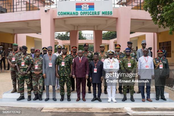 The defence chiefs from the Economic Community of West African States countries pose for a group photo during their extraordinary meeting on August...