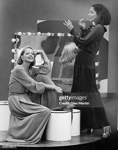 Fashions - Women; Curtain call: Terra Cotta shaded evening pajamas of crepe georgette, and a raisin crepe gown of tiers, pleats and ruffle accents.;