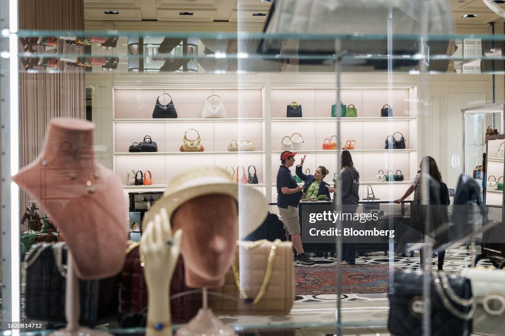Customers in a Gucci store at the Westfield Valley Fair shopping