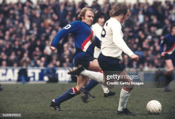 Manchester City forward Francis Lee in the City third kit challenges Phil Beal of Spurs during a First Division match at White Hart Lane on February...