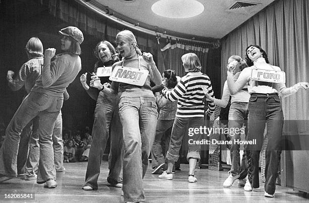 Children's Theatre; Pippi Longstocking, right, watches the Junior League actresses go through a routine in the show, "Granny's Attic." The 11 women...